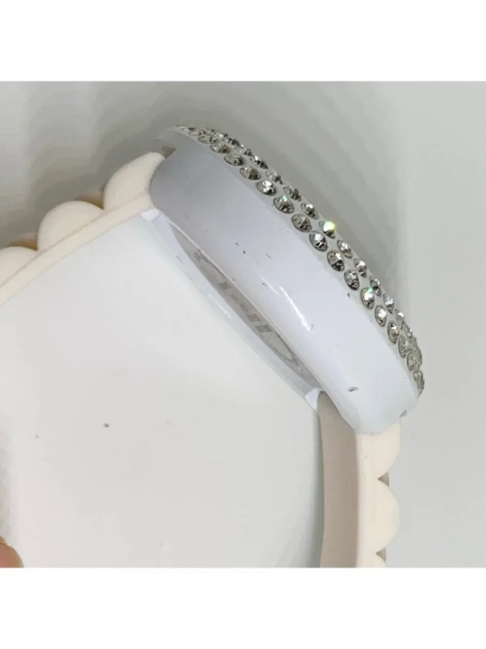 Geneva women’s watch white tone rhinestones 45mm silicone band running